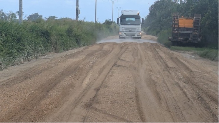 Motor grader shaping road surface after RP Plus treatment