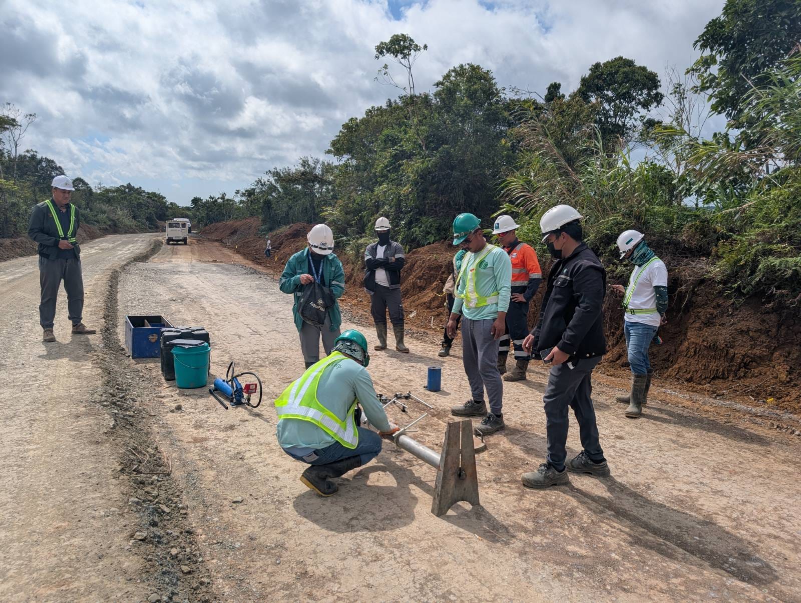 Field engineers conducting soil strength testing